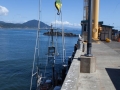 Fishing boat being hoisted onto dry dock at Port Orford