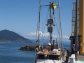 Fishing boat being hoisted onto dry dock at Port Orford