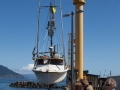 Fishing boat being hoisted onto dry dock at Port Orford