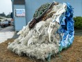 Washed Away Art - Wave-riding Sea Turtle Sculpture - made from reclaimed plastic trash that washed ashore