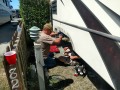 Brookings - Local RV mobile repairman working on getting our slide to close.