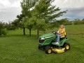 Kim having a blast mowing the lawn