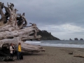 Mom & Kim at giant driftwood log on First Beach