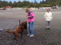 Mom & Kim playing with the pups on First Beach