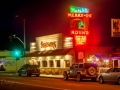 Street scene with Margie's Merry-Go Round Restaurant Neon