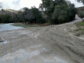 Mud and sand runoff after heavy rains at Silent Valley Club.