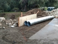 Repairs on washed out culvert at Silent Valley Club.