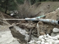 Culvert washed out after heavy rains at Silent Valley Club.